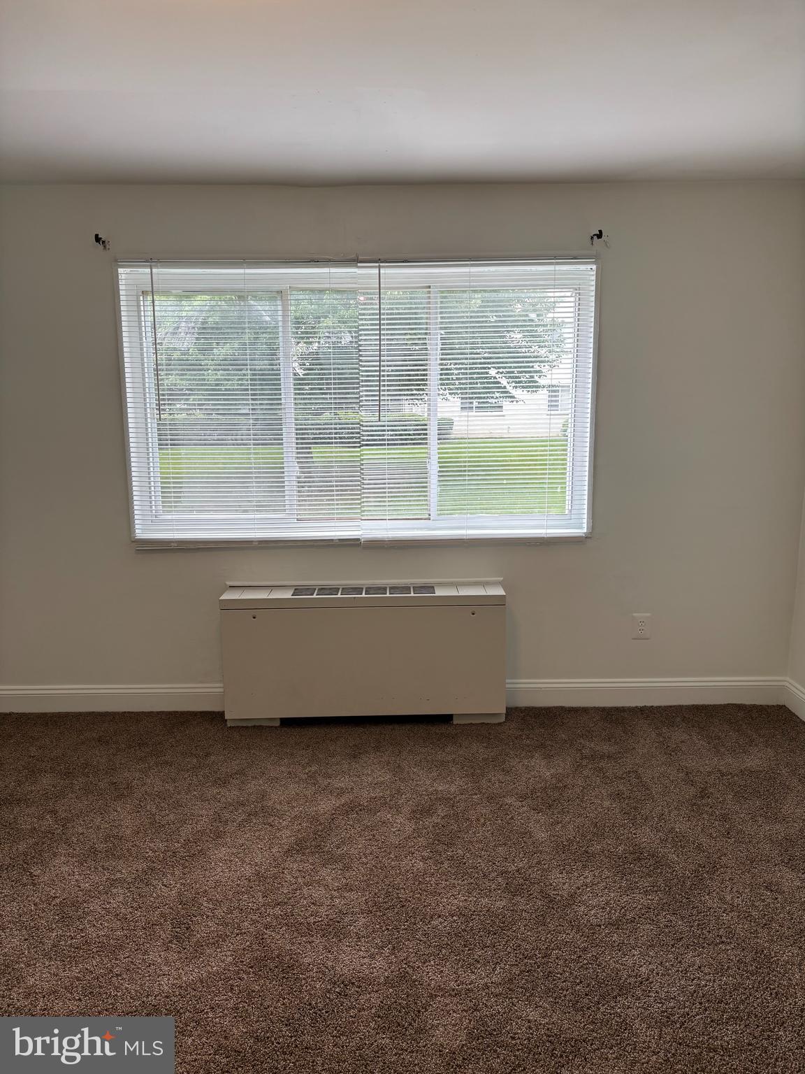 1005 Chillum Road, Unit 212 Hyattsville, MD 20782 - Photo 10 of 13 an empty room with a window