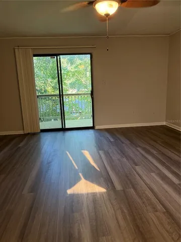 a bathroom with a toilet a sink and a mirror