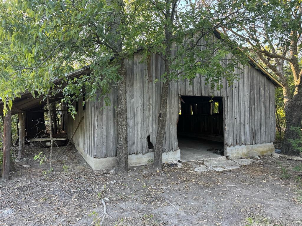 10350 Clear Creek Road West Sanger, TX 76266 - Photo 4 of 23 a view of a backyard
