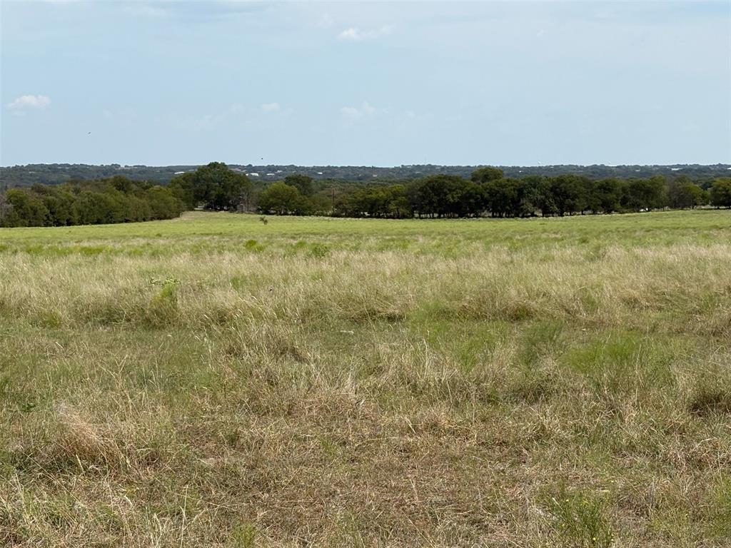 10350 Clear Creek Road West Sanger, TX 76266 - Photo 8 of 23 a view of a field with an ocean view