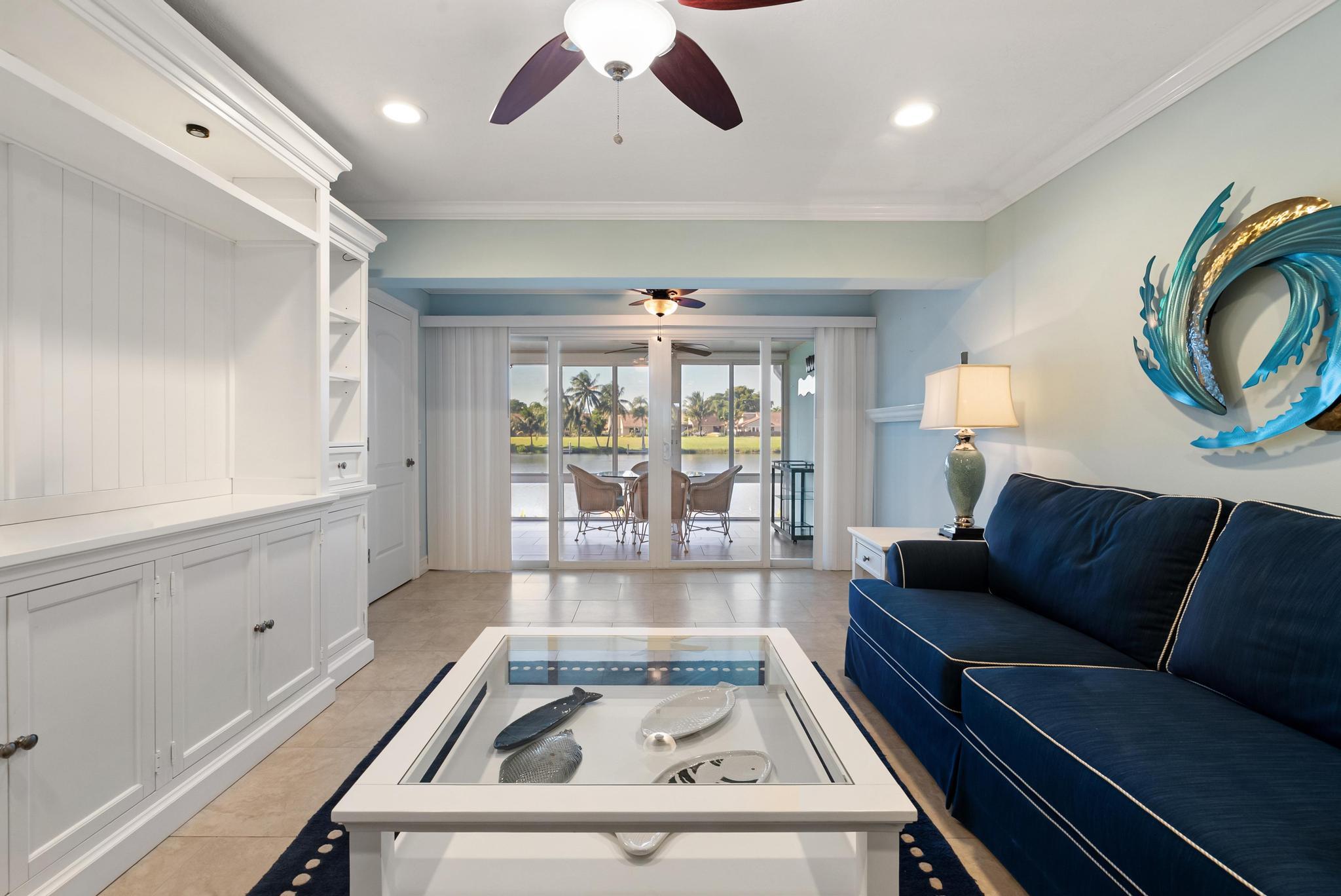 1280 Northwest 20th Avenue, Unit 101 Delray Beach, FL 33445 - Photo 13 of 31 a living room with furniture