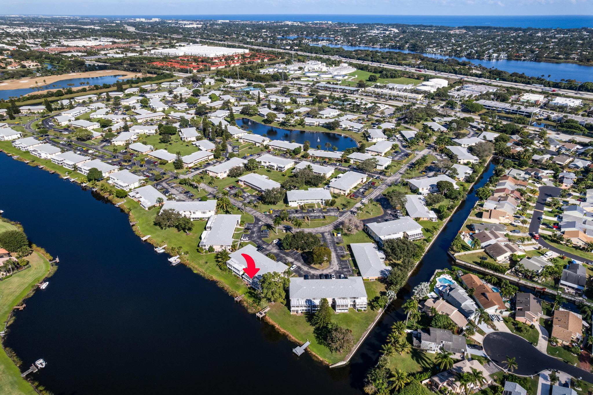 1280 Northwest 20th Avenue, Unit 101 Delray Beach, FL 33445 - Photo 24 of 31 an aerial view of a city
