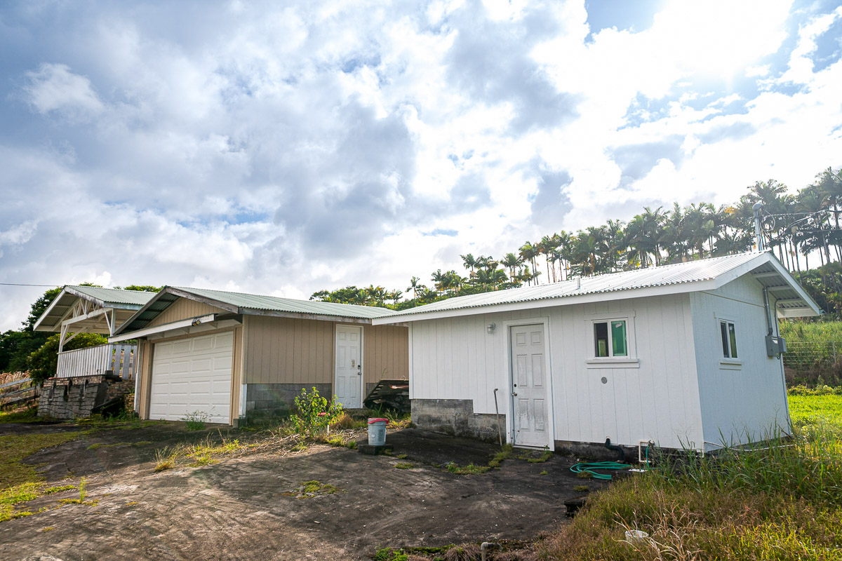 681 Lot 2-b Hoaka Road Hilo, HI 96720 - Photo 11 of 30 a view of a house with backyard and trees