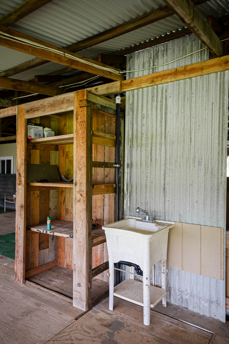 681 Lot 2-b Hoaka Road Hilo, HI 96720 - Photo 15 of 30 a table and chairs in front of a house