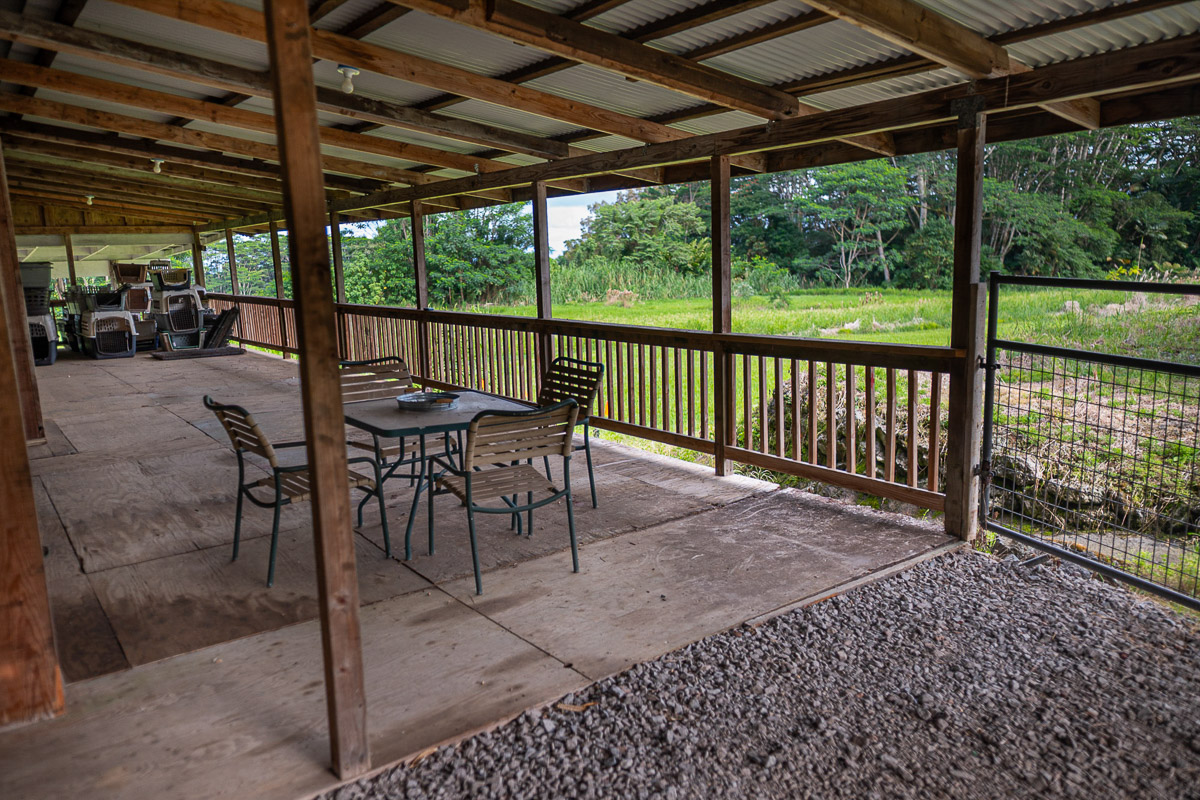 681 Lot 2-b Hoaka Road Hilo, HI 96720 - Photo 19 of 30 a view of a patio with table and chairs next to a yard