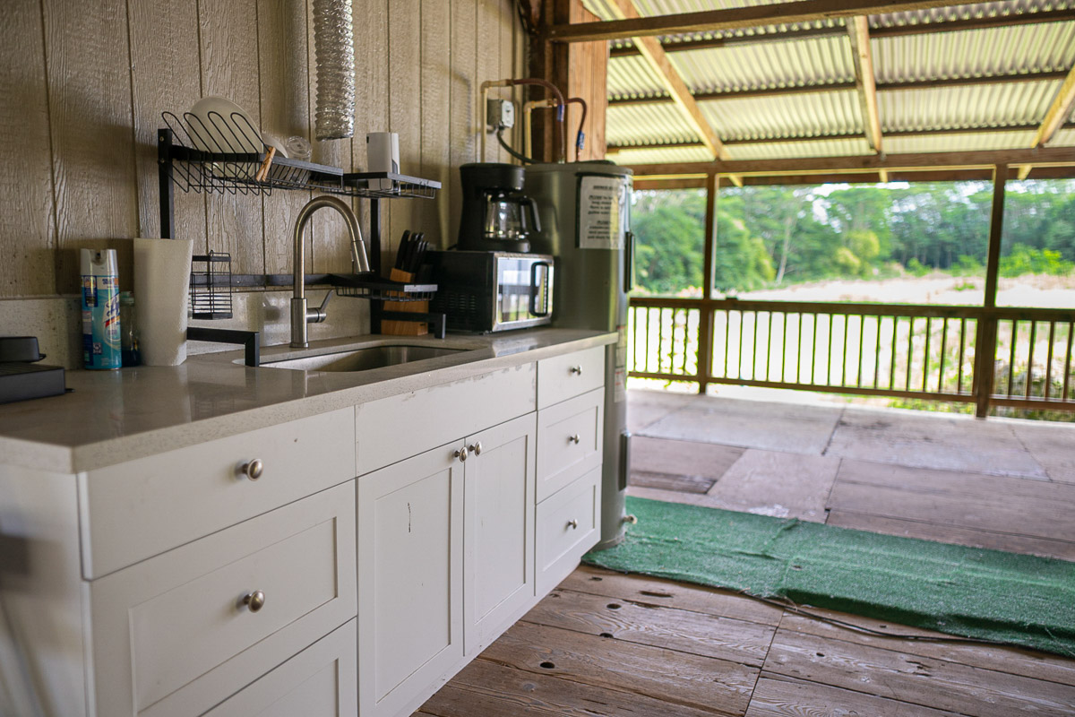 681 Lot 2-b Hoaka Road Hilo, HI 96720 - Photo 22 of 30 a kitchen with sink and cabinets