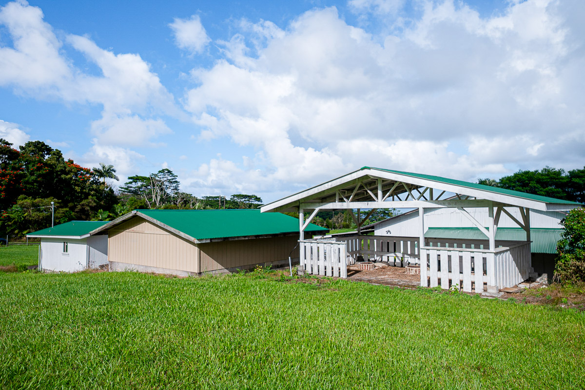 681 Lot 2-b Hoaka Road Hilo, HI 96720 - Photo 4 of 30 a view of a house with a yard and a garden