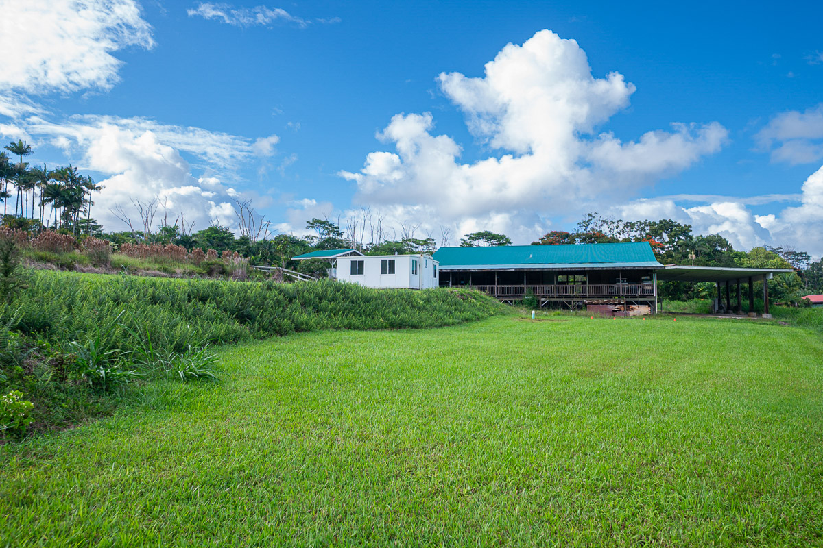 681 Lot 2-b Hoaka Road Hilo, HI 96720 - Photo 8 of 30 a view of a fountain in front of the house