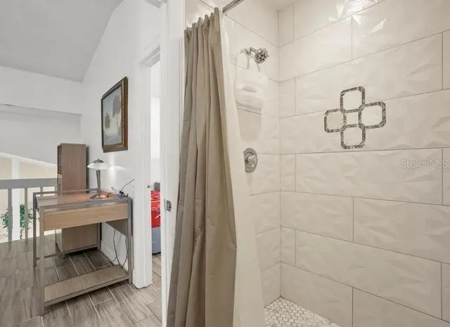 a view of entryway with wooden floor