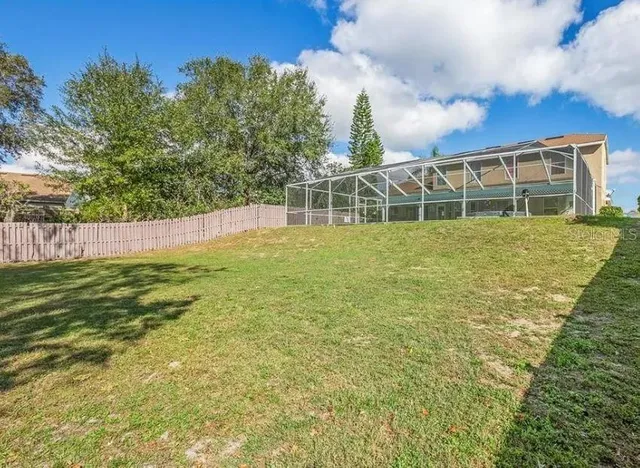 a view of building with yard