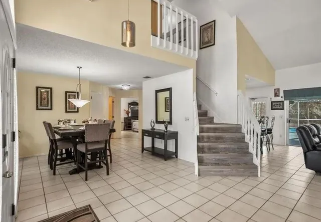 a view of a dining room with furniture
