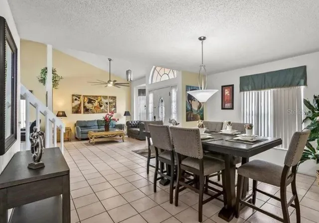 a view of a dining room with furniture