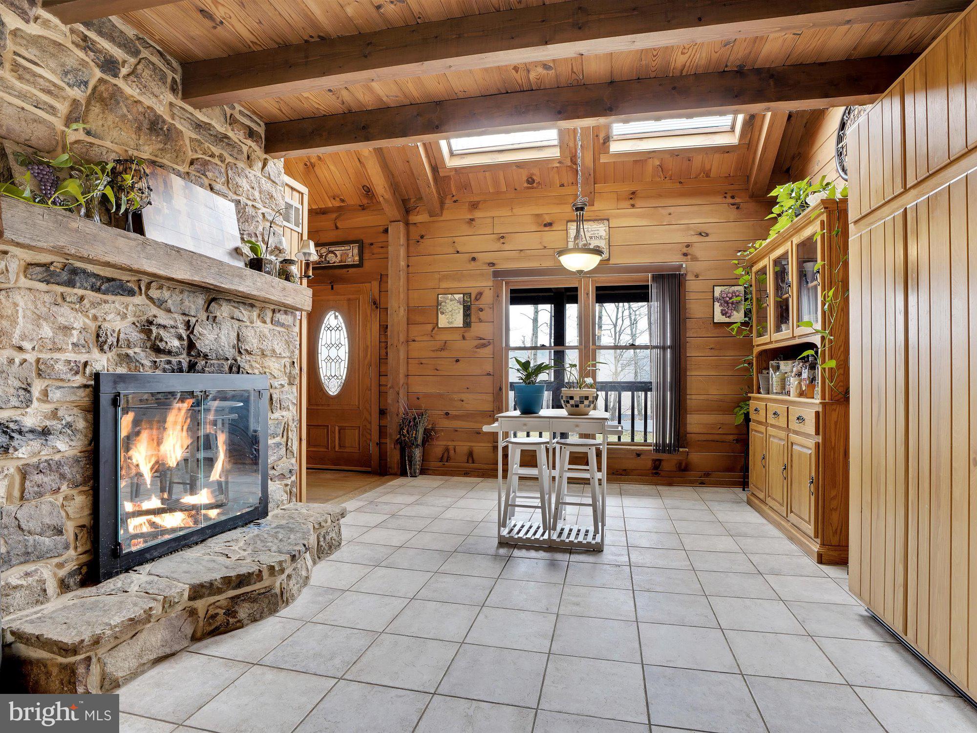 1678 Pisgah State Road Shermans Dale, PA 17090 - Photo 14 of 34 Breakfast room with fireplace