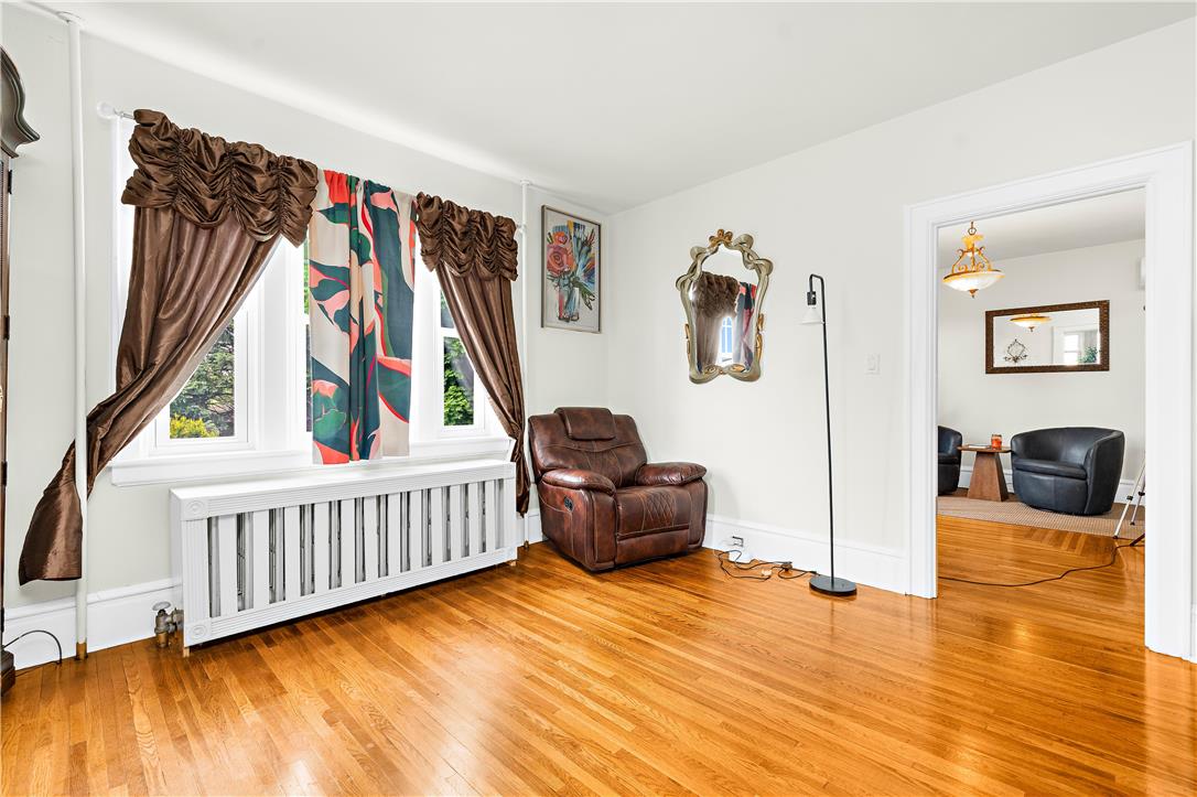 2055 Ferry Street Wilson, PA 18042 - Photo 9 of 21 This inviting space features lustrous hardwood floors and abundant natural light, perfect for everyday living.