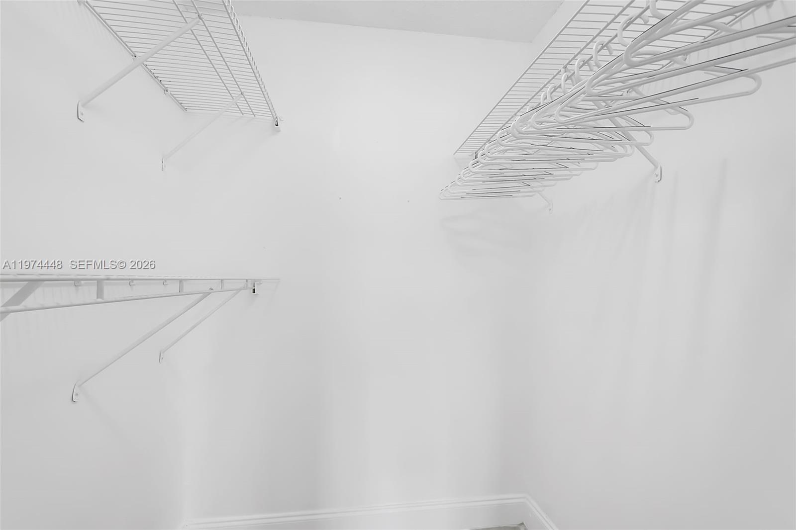 13787 Southwest 66th Street, Unit 254D Miami, FL 33183 - Photo 13 of 18 a view of small space with racks on the wall