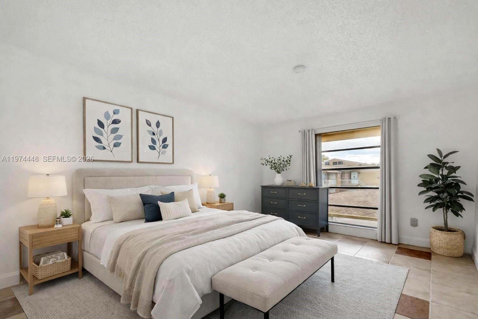 13787 Southwest 66th Street, Unit 254D Miami, FL 33183 - Photo 3 of 18 a bedroom with a bed and a potted plant