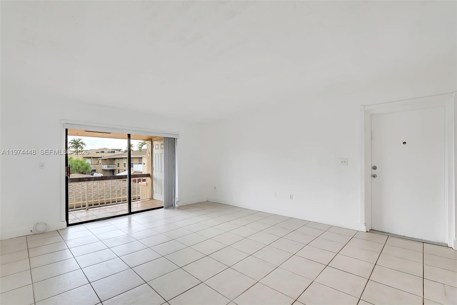 13787 Southwest 66th Street, Unit 254D Miami, FL 33183 - Photo 7 of 15 an empty room with windows