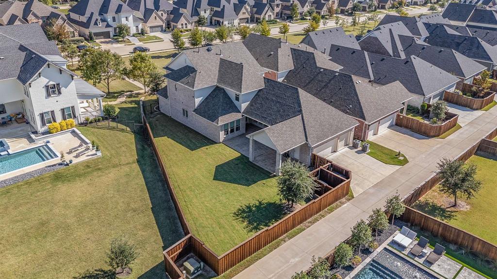 910 Marie Drive Allen, TX 75013 - Photo 37 of 38 an aerial view of a house with swimming pool and outdoor seating