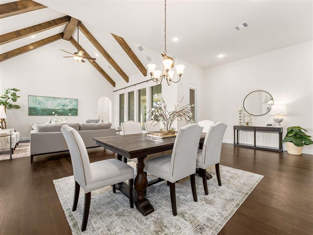 910 Marie Drive Allen, TX 75013 - Photo 9 of 38 a view of a dining room with furniture and wooden floor