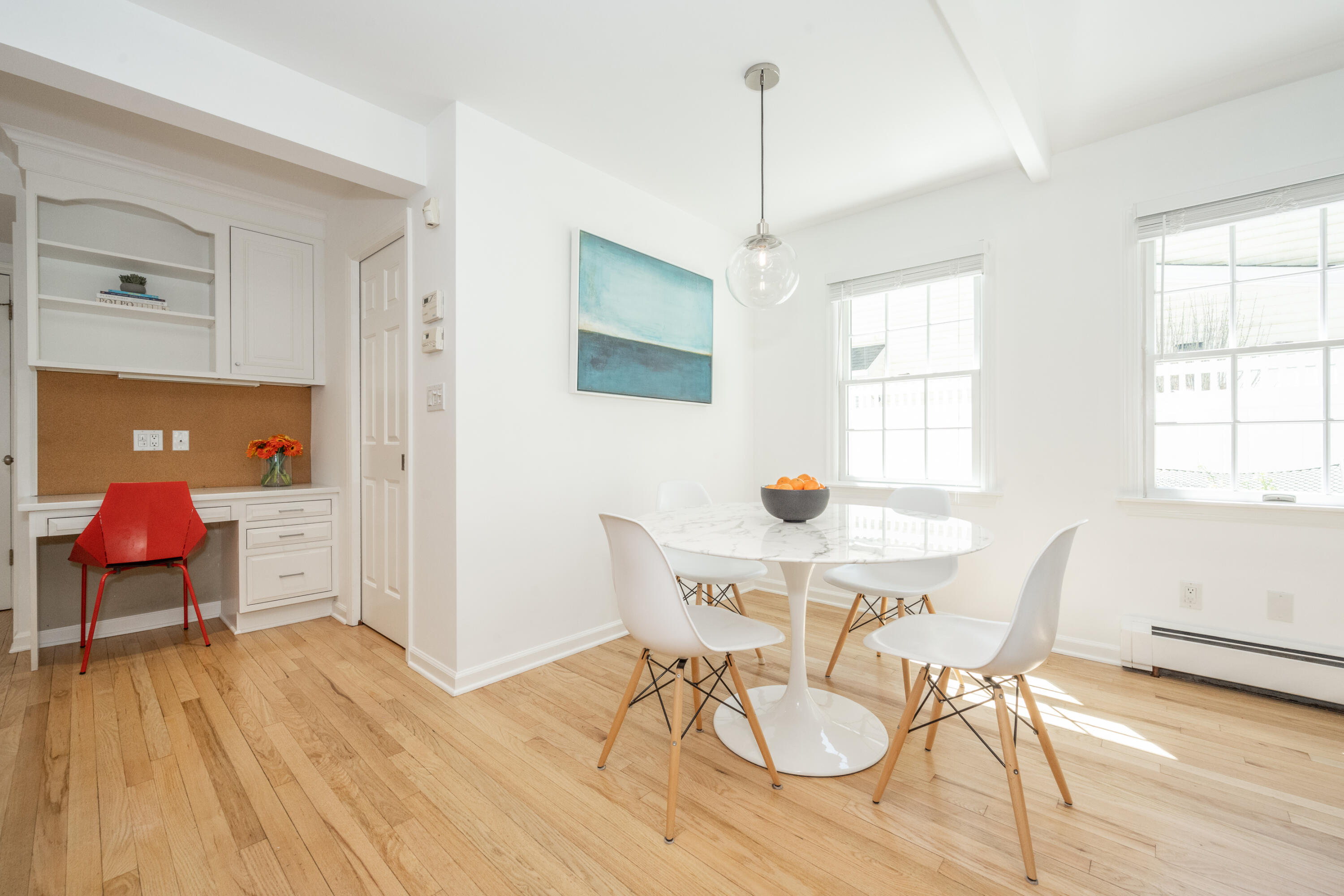 35 Miles Road Darien, CT 06820 - Photo 12 of 29 a view of a dining room with furniture window and wooden floor