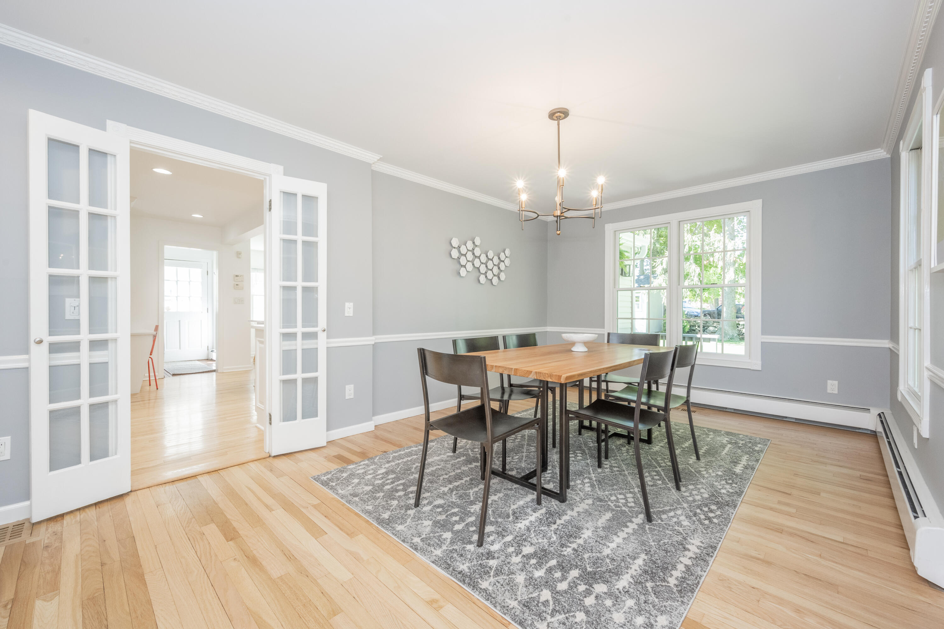35 Miles Road Darien, CT 06820 - Photo 7 of 29 a view of a dining room with furniture window and wooden floor