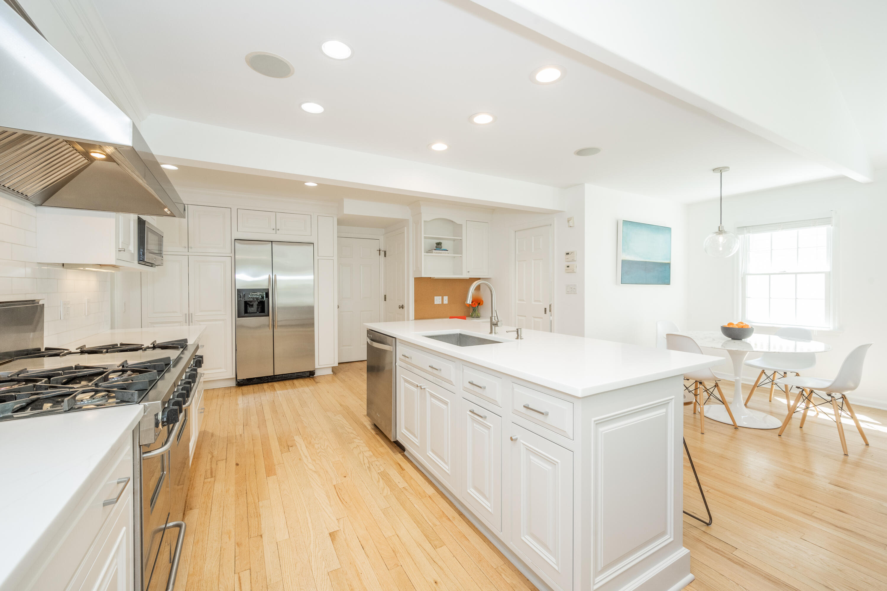 35 Miles Road Darien, CT 06820 - Photo 9 of 29 a large kitchen with a lot of counter space and wooden floor