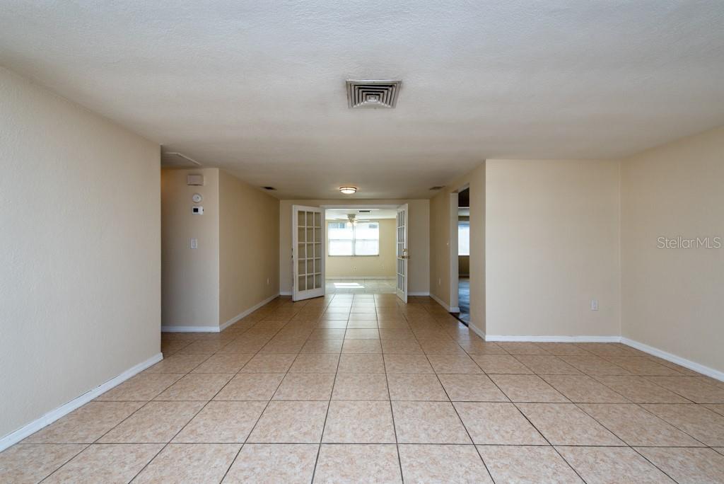 5117 School Road New Port Richey, FL 34653 - Photo 2 of 24 a view of an empty room and window