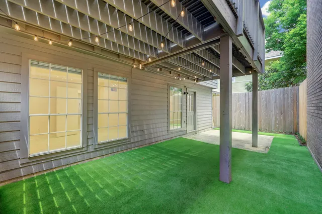 a view of a balcony with wooden floor