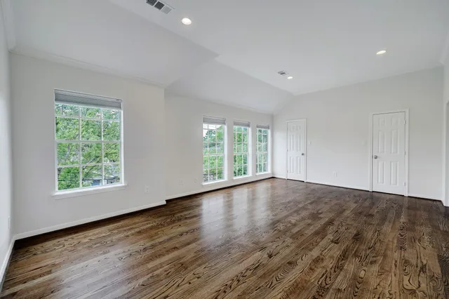 a kitchen with stainless steel appliances a stove top oven and a sink