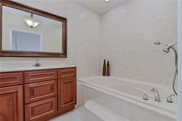 a bathroom with a sink and a bathtub