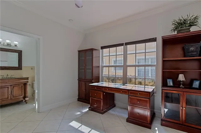 a room with pool table and flat screen tv