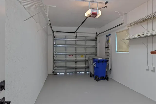 a view of room with a ceiling fan