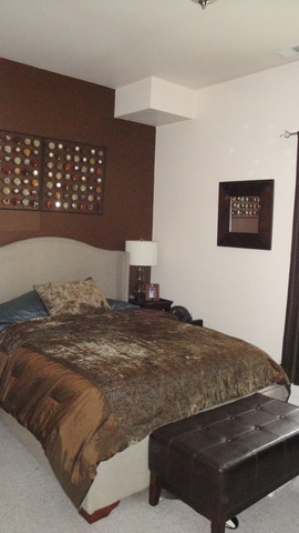 2807 West Jackson Boulevard, Unit 2 Chicago, IL 60612 - Photo 11 of 13 a bedroom with a bed