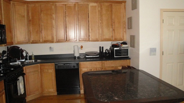 2807 West Jackson Boulevard, Unit 2 Chicago, IL 60612 - Photo 6 of 13 a kitchen with a sink and cabinets