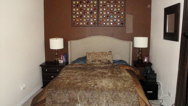 2807 West Jackson Boulevard, Unit 2 Chicago, IL 60612 - Photo 9 of 13 a bed room with a bed and a lamp