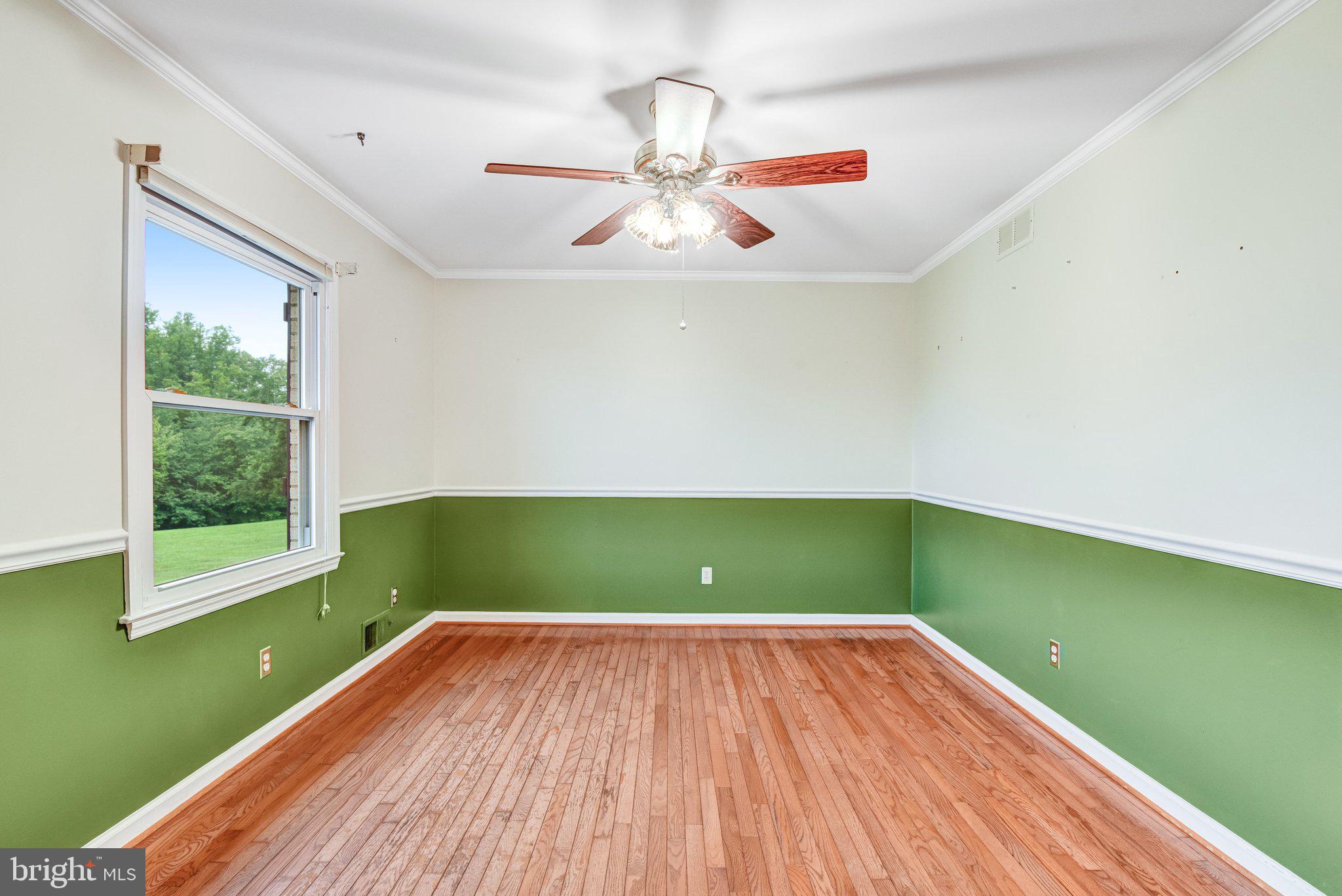 7961 Leeds Manor Road Marshall, VA 20115 - Photo 8 of 40 view of a room with wooden floor fan and window