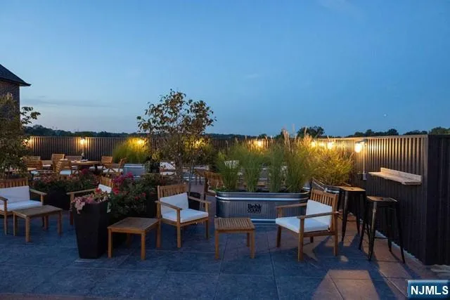 a utility room with sink dryer and washer