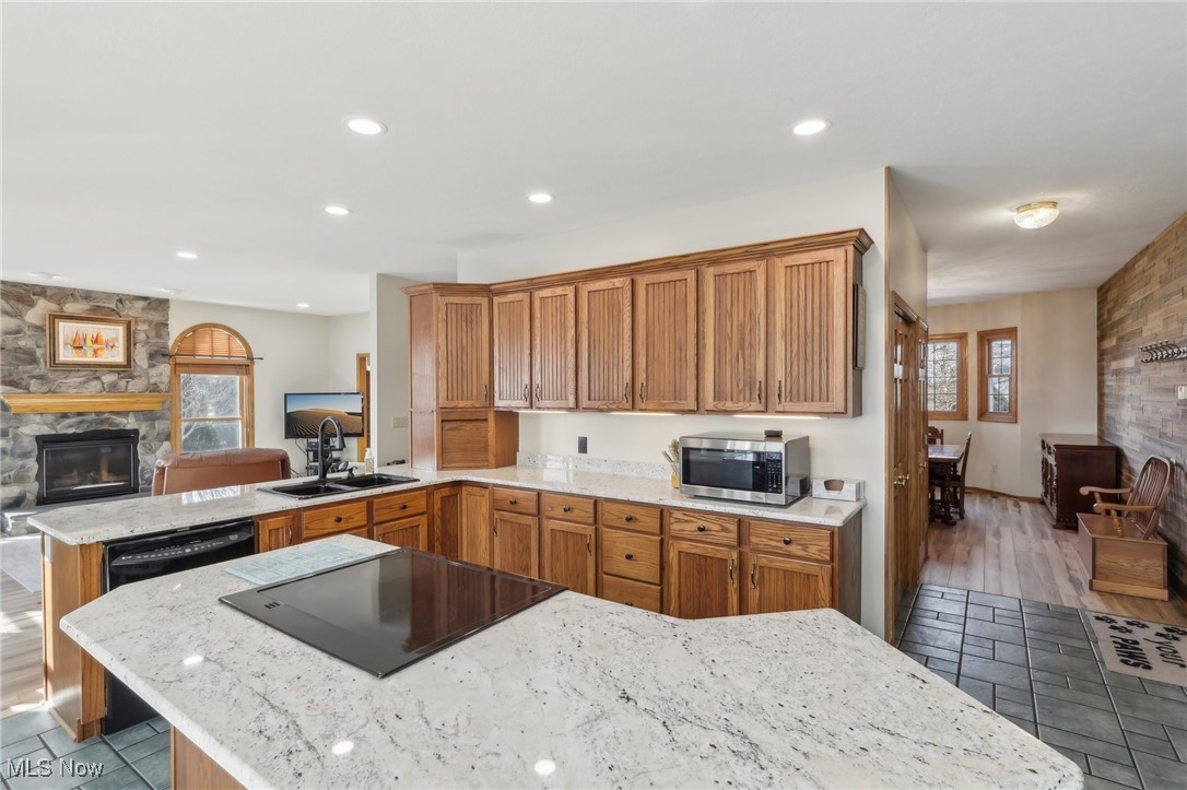 5475 Windfall Road Medina, OH 44256 - Photo 9 of 41 Countertop stove in peninsula