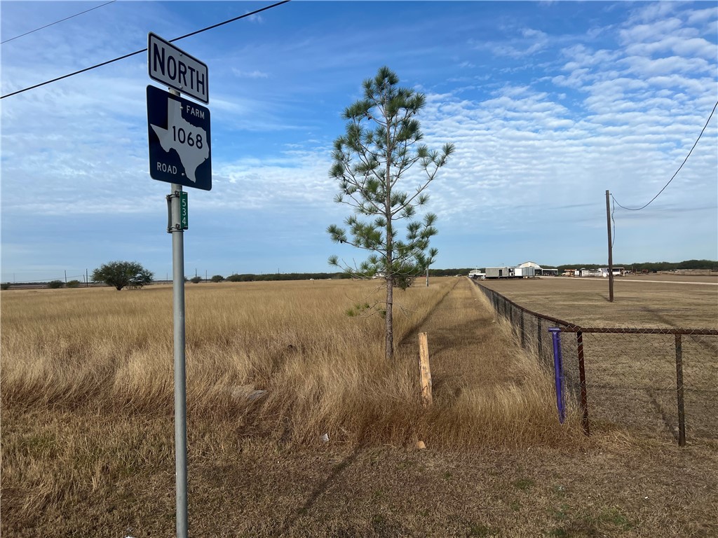 a street sign on a pole on a street