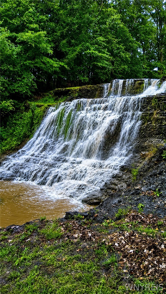 10977 Silver Road Bethany, NY 14054 - Photo 5 of 50 Please Note: Enhanced Photo of Seasonal Waterfall.