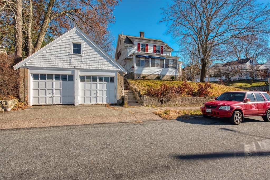 3 Crescent Road Needham, MA 02494 - Photo 2 of 5 a front view of a house with a yard