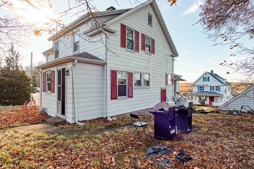3 Crescent Road Needham, MA 02494 - Photo 4 of 5 a view of a house with wooden fence