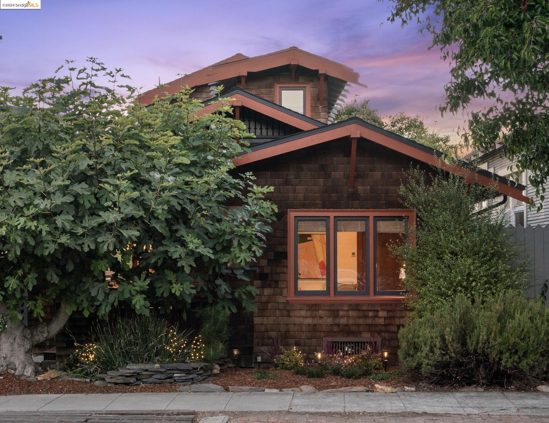1195 Hearst Avenue Berkeley, CA 94702 - Photo 1 of 1 a front view of a house with a yard