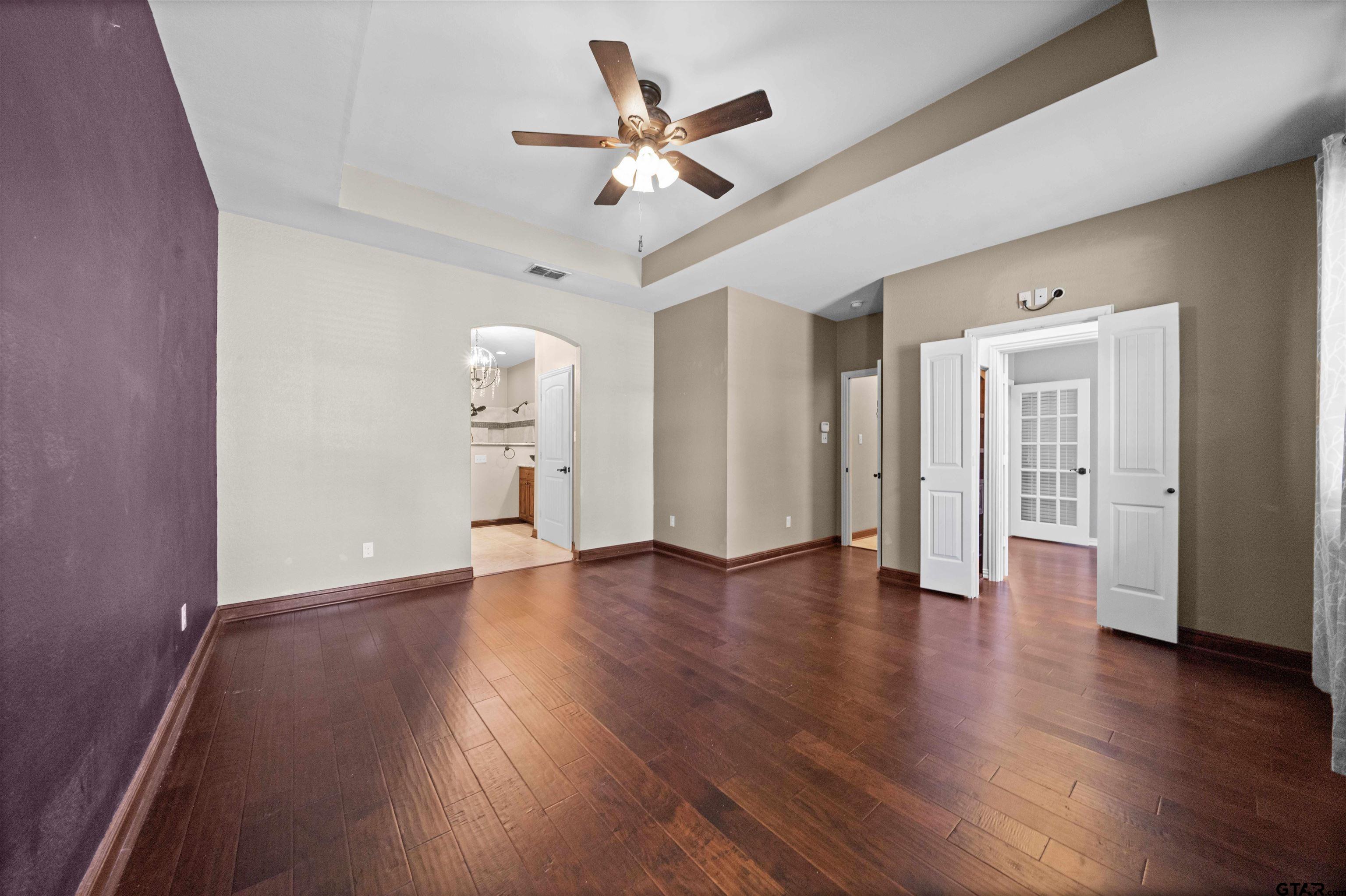 17153 County Road 1108 Flint, TX 75762 - Photo 18 of 45 a view of an empty room and wooden floor