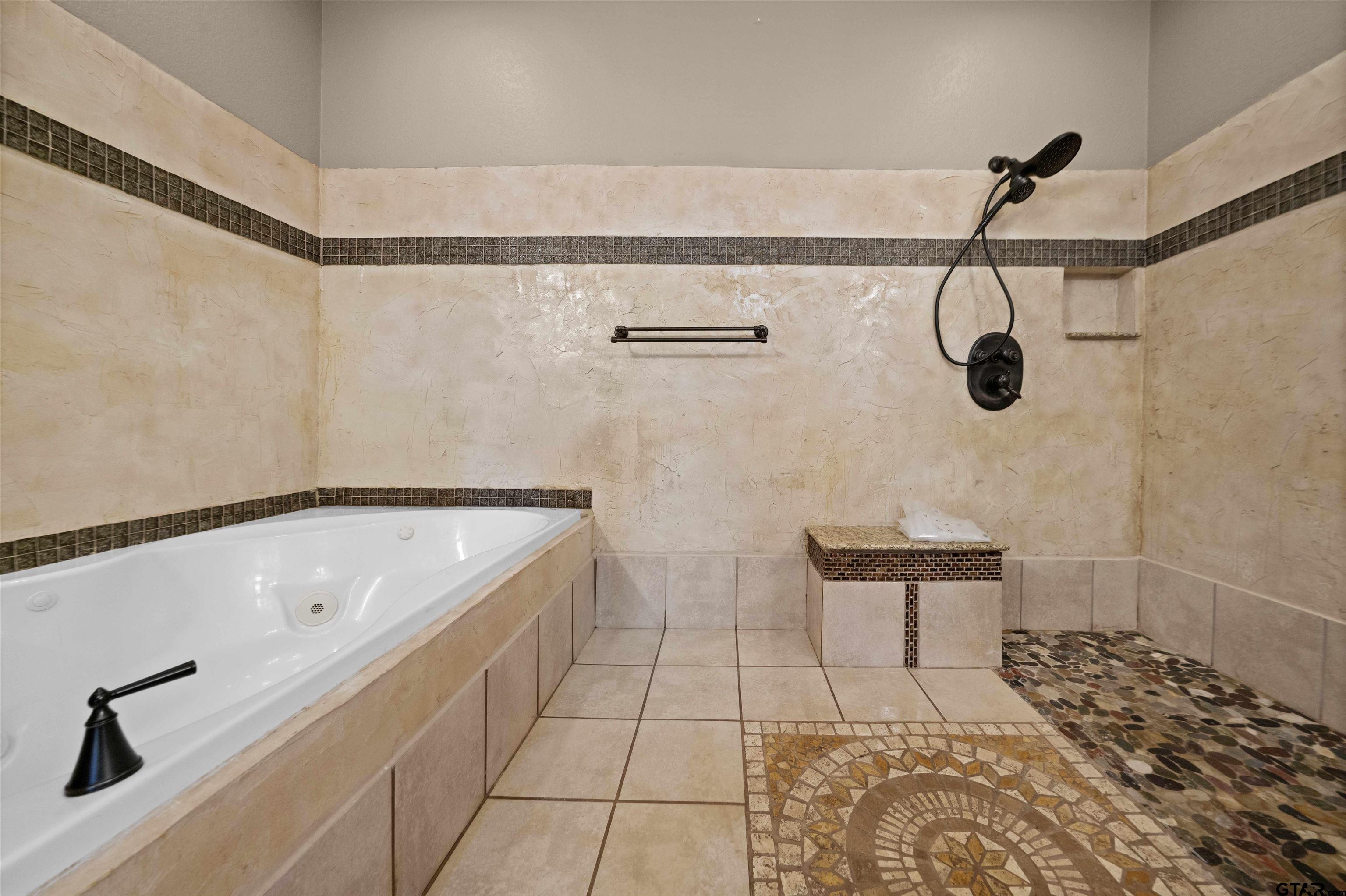 17153 County Road 1108 Flint, TX 75762 - Photo 24 of 45 a bathroom with a bathtub and shower