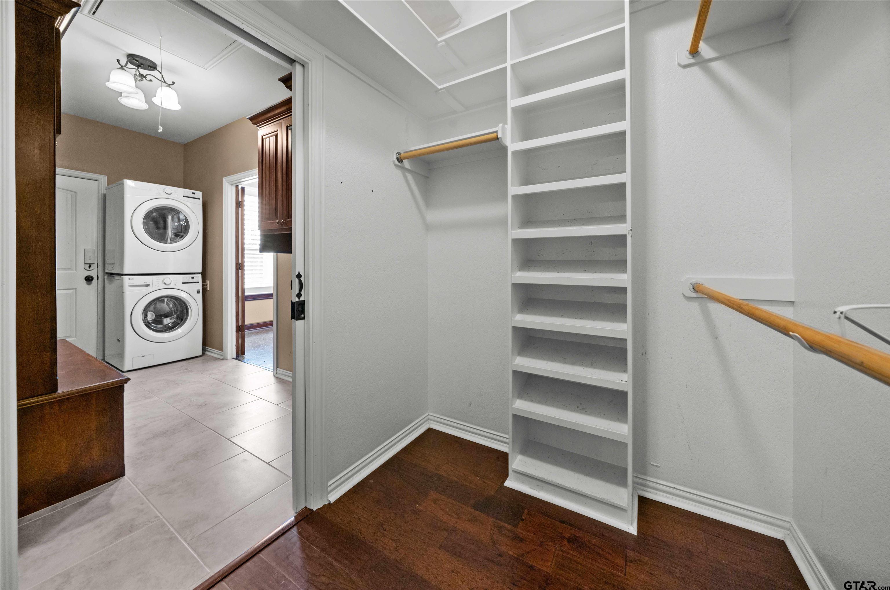 17153 County Road 1108 Flint, TX 75762 - Photo 28 of 45 a view of walk in closet with empty racks