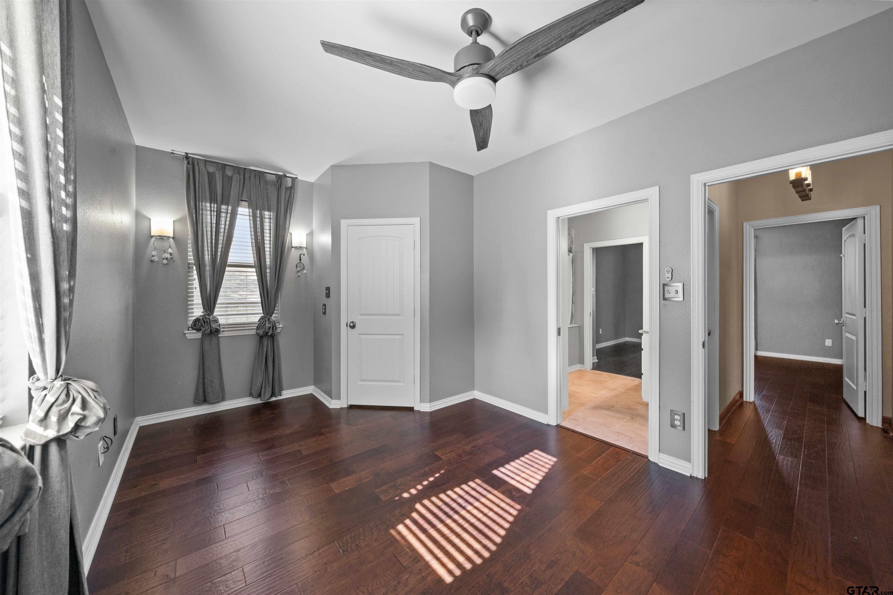 17153 County Road 1108 Flint, TX 75762 - Photo 31 of 45 a view of a hallway with wooden floor and staircase