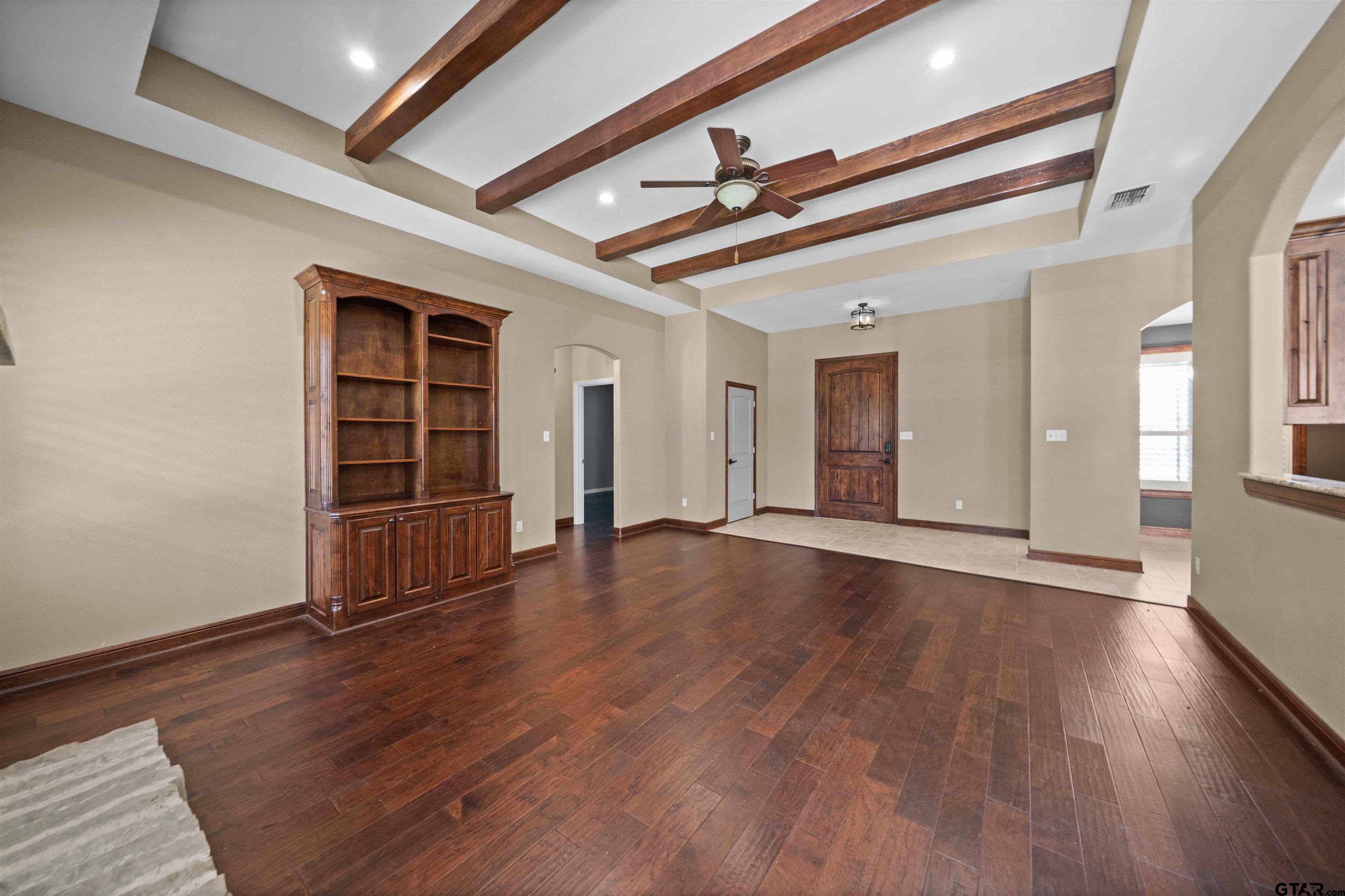 17153 County Road 1108 Flint, TX 75762 - Photo 4 of 45 a view of an empty room with wooden floor and a window