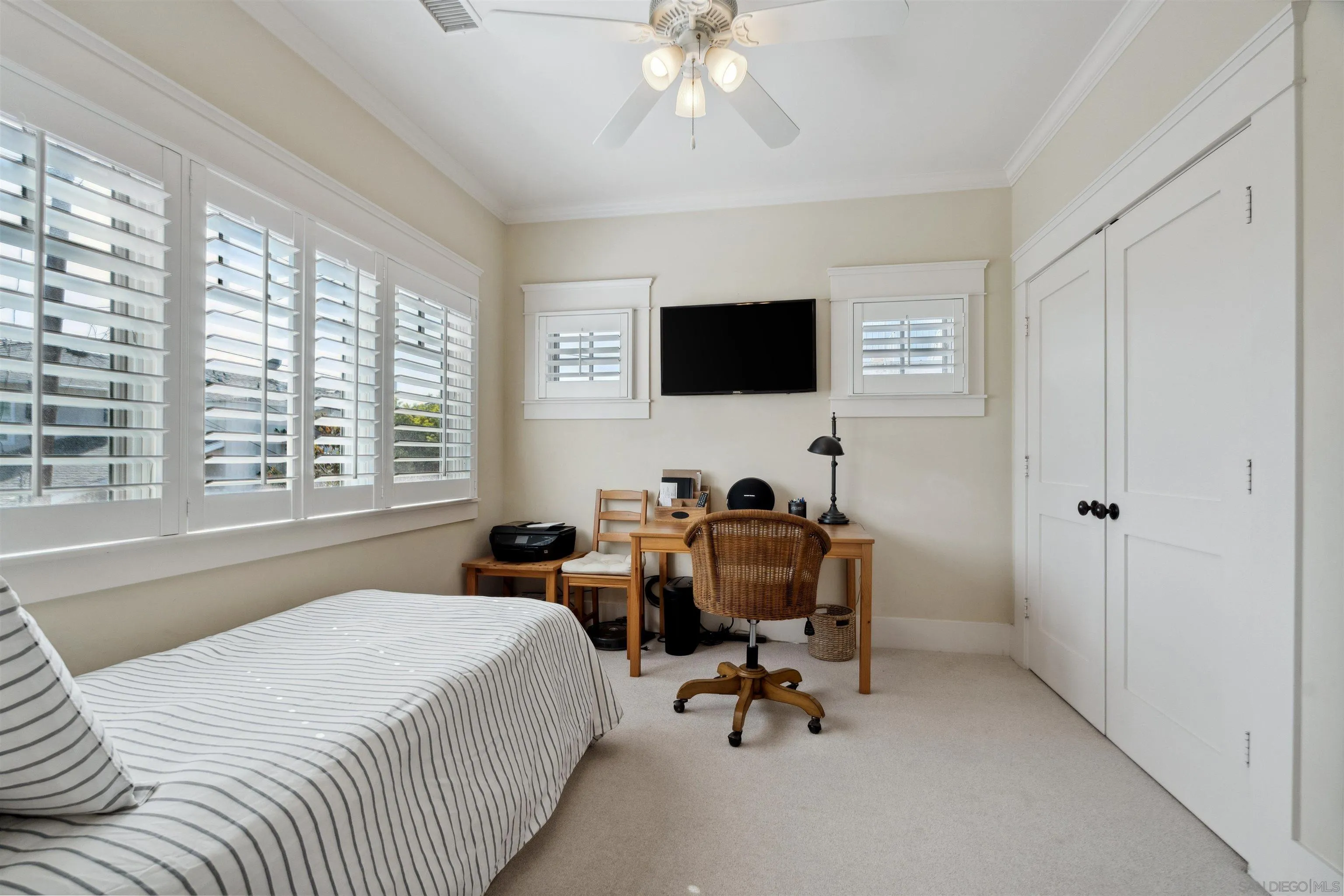 731 Balboa Avenue Coronado, CA 92118 - Photo 16 of 18 a bedroom with a bed and a flat screen tv