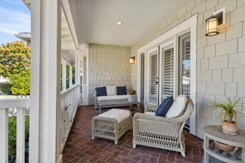 a balcony with furniture and garden